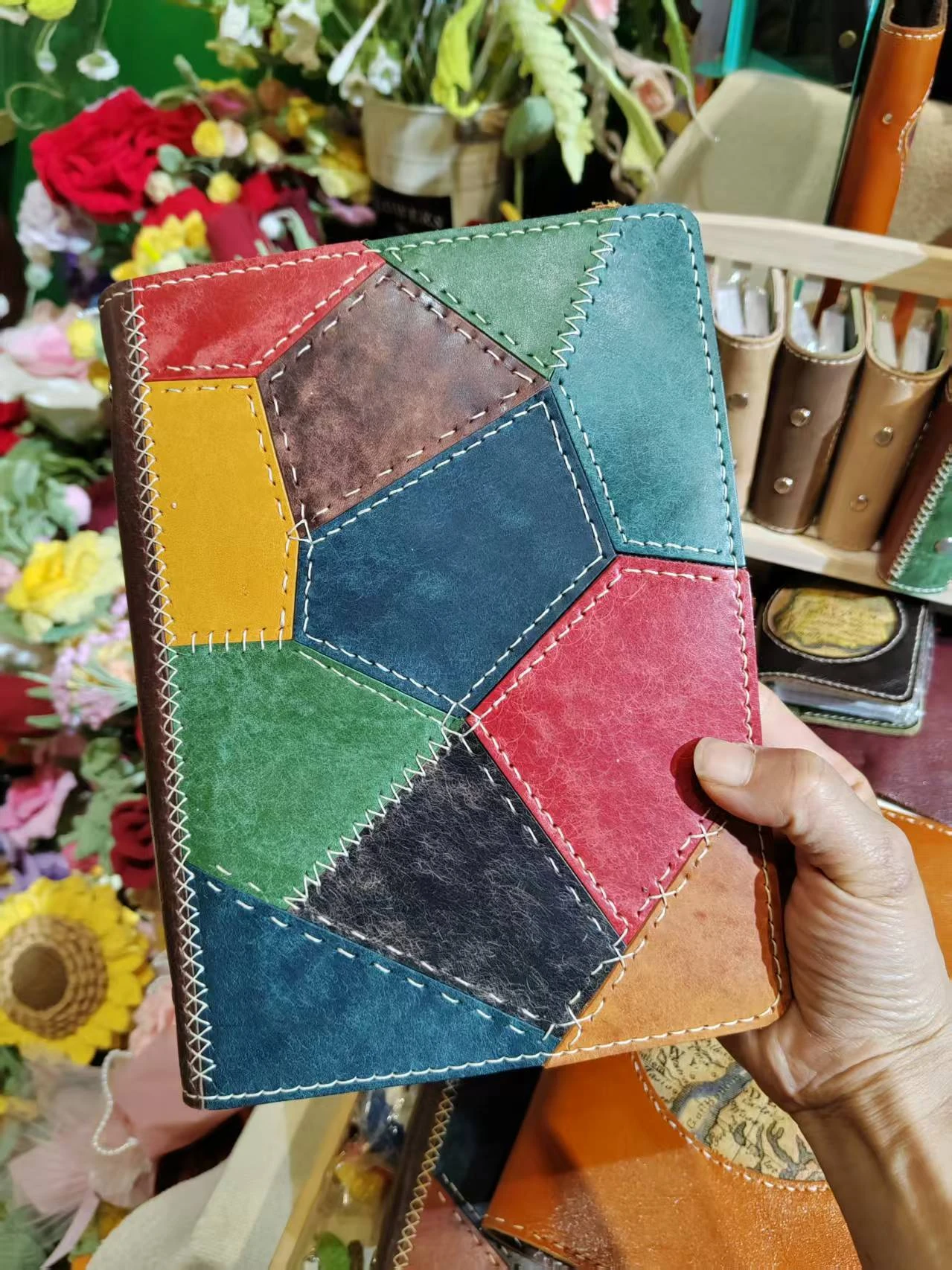 Second front view of colorful handmade patchwork leather notebook